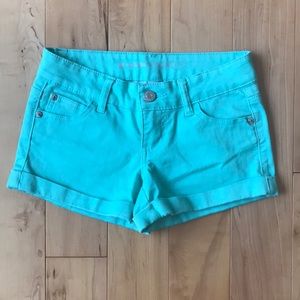 Teal colored shorts